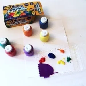 recycled lid suncatcher rainbow crafts - crafts for kids- kid crafts - acraftylife.com #preschool #kidscraft #craftsforkids 