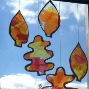 leaf suncatcher - autumn kid craft - fall kid crafts crafts for kids- acraftylife.com #preschool #craftsforkids #kidscrafts