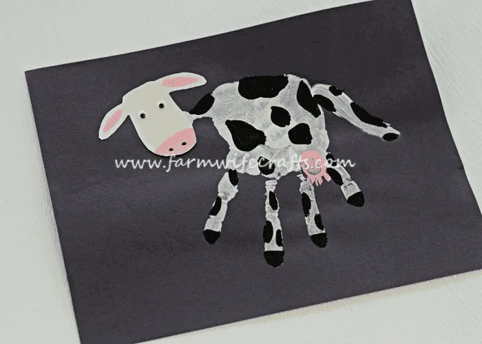 handprint cow kid craft - cow kid craft - farm kid crafts - crafts for kids- acraftylife.com #preschool #craftsforkids #kidscrafts