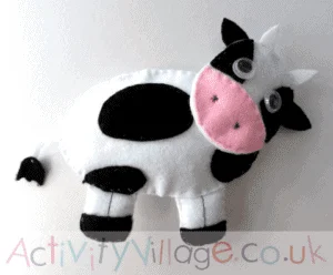 cow softie kid craft - cow kid craft - farm kid crafts - crafts for kids- acraftylife.com #preschool #craftsforkids #kidscrafts