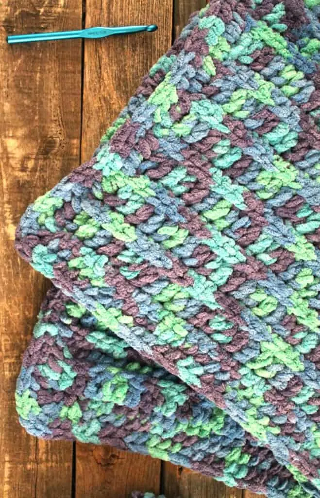 Try this pretty ocean baby blanket pattern. It would be perfect for a boy.