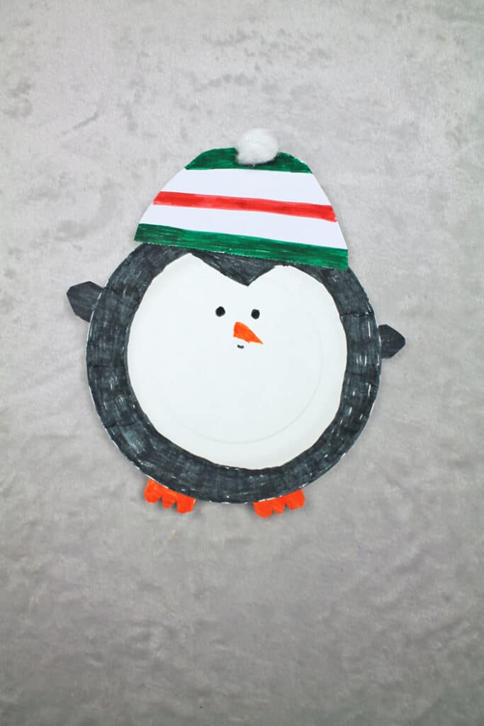 Penguin Christmas ornament paper plate craft for kids