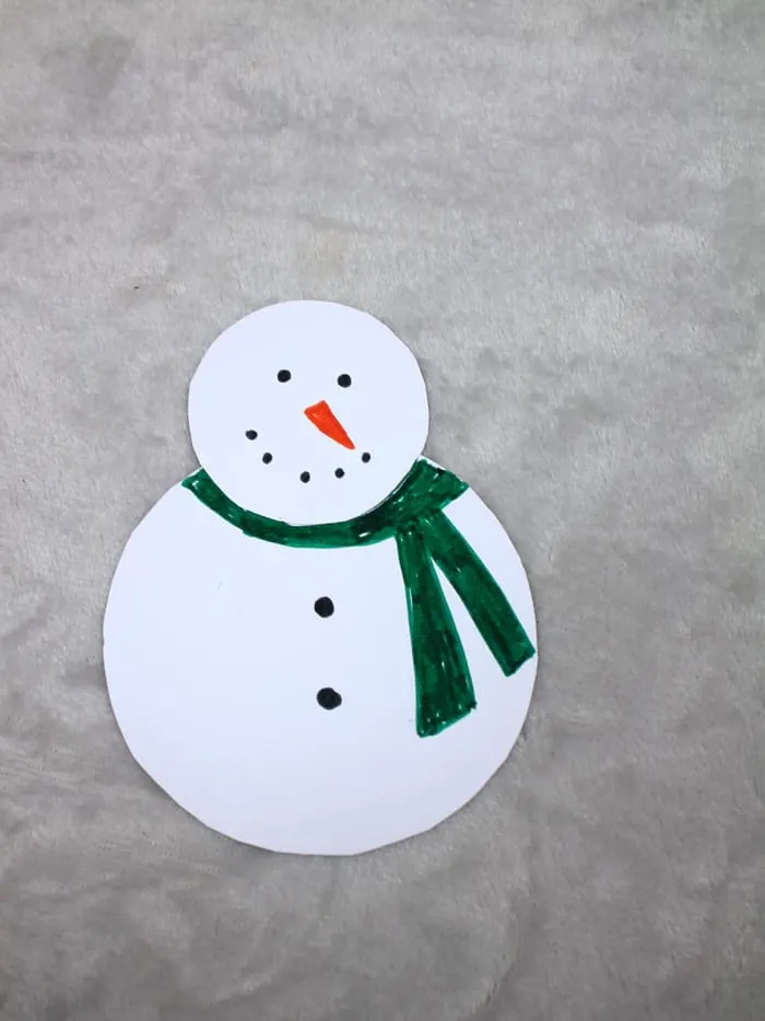 Make a fun and easy paper snowman ornament craft for kids.