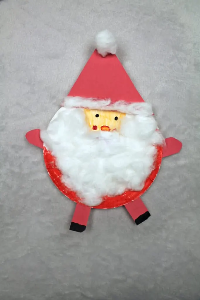 Make a cute Santa ornament out of a paper plate.