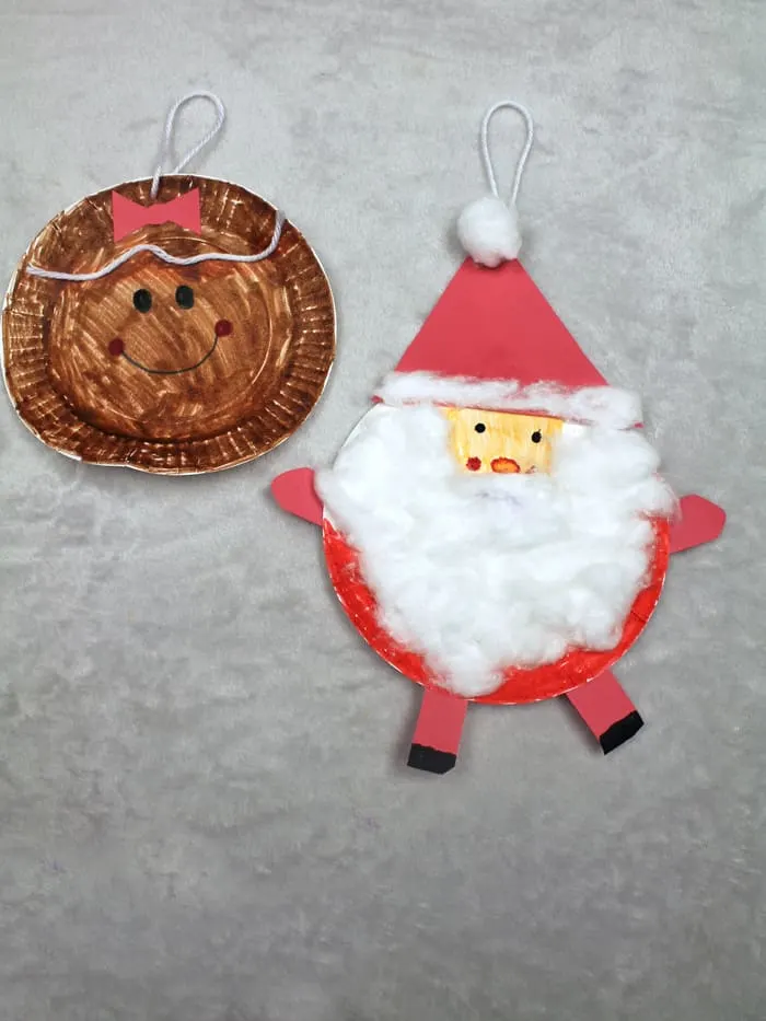 Make a paper plate Santa ornament Christmas craft.