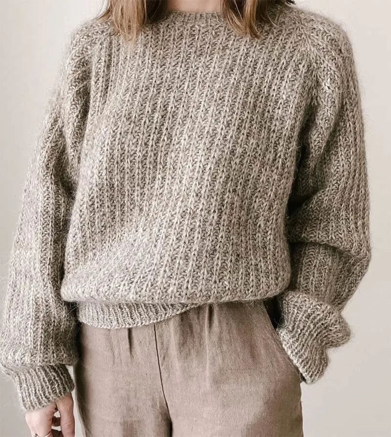 Try this classic knit sweater pattern. It would be great for beginners.