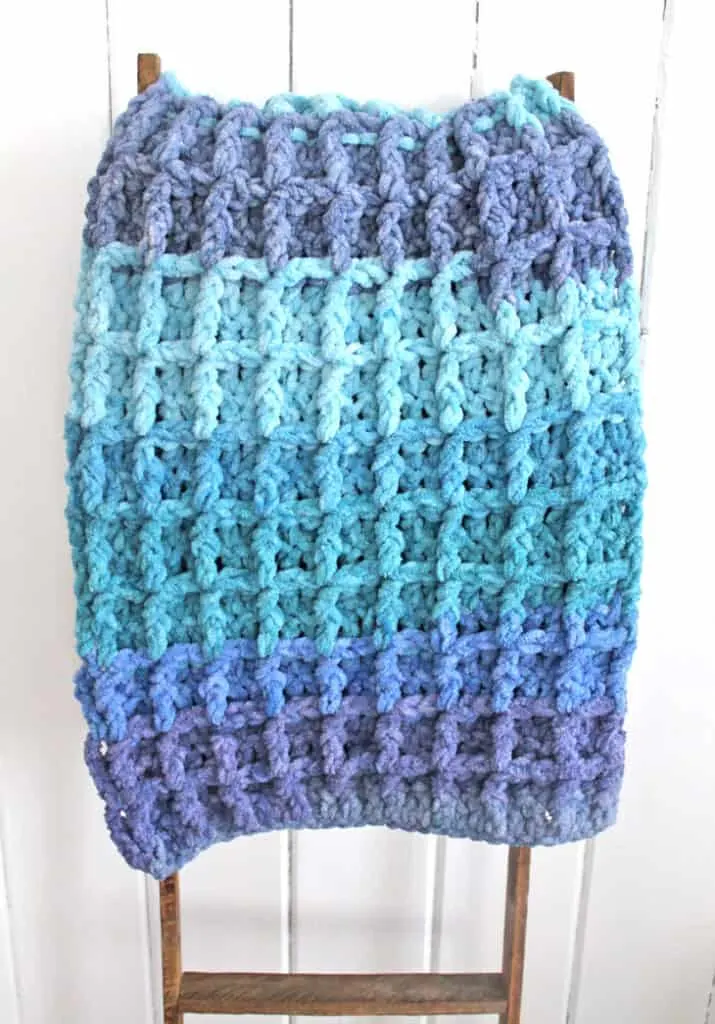 Make this chunky crocheted waffle stitch blanket.