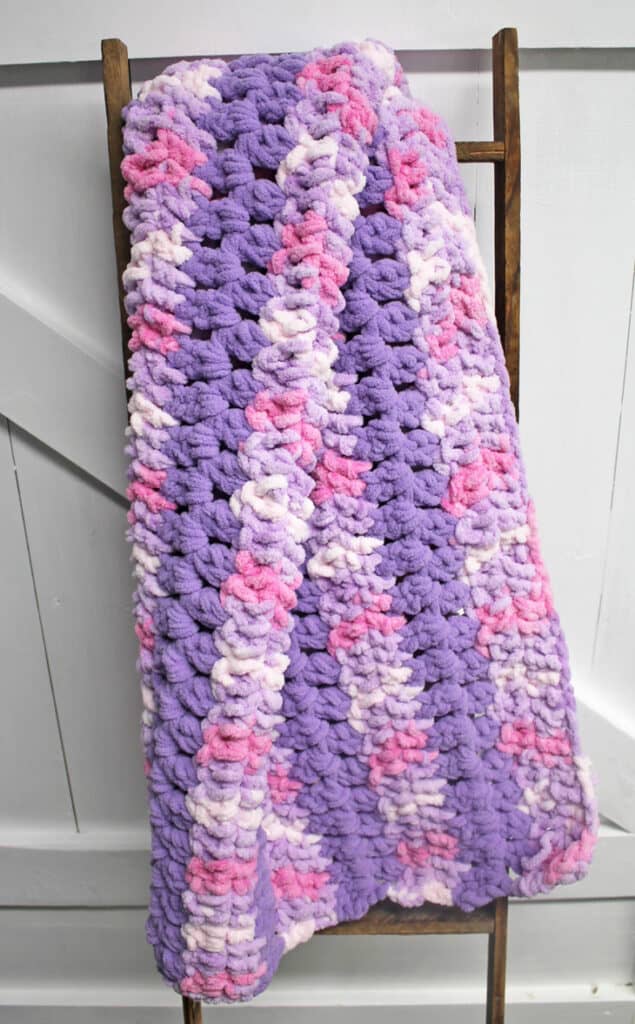 Make an easy chunky crocheted blanket pattern.
