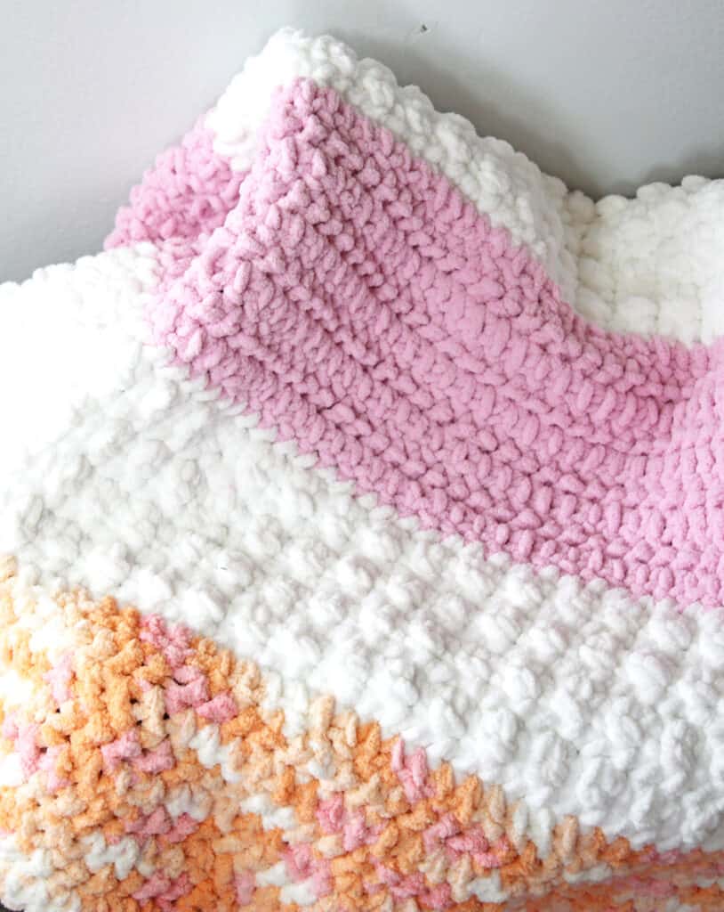 Make this easy chunky striped baby blanket pattern.