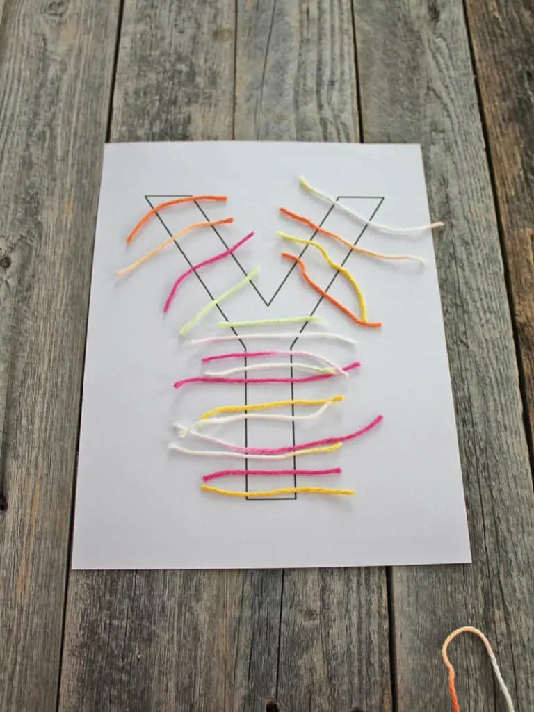 Use this letter Y printable template to make an easy yarn craft for preschool.