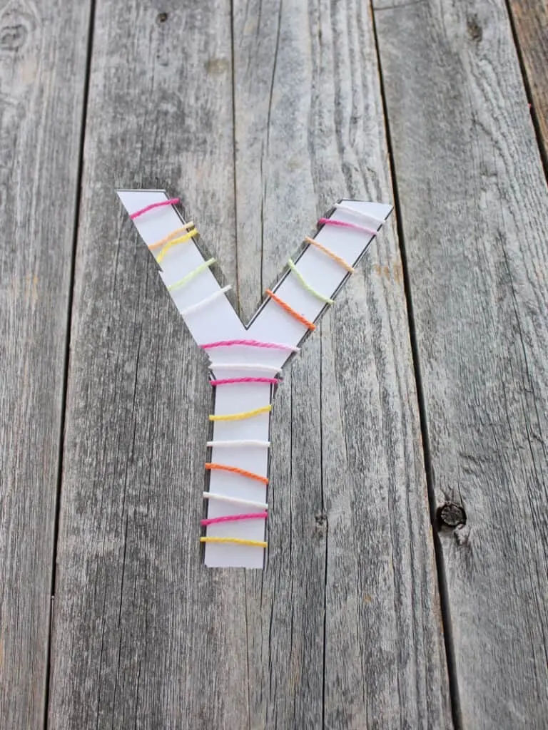 Use this letter Y printable template to make an easy yarn craft for preschool.