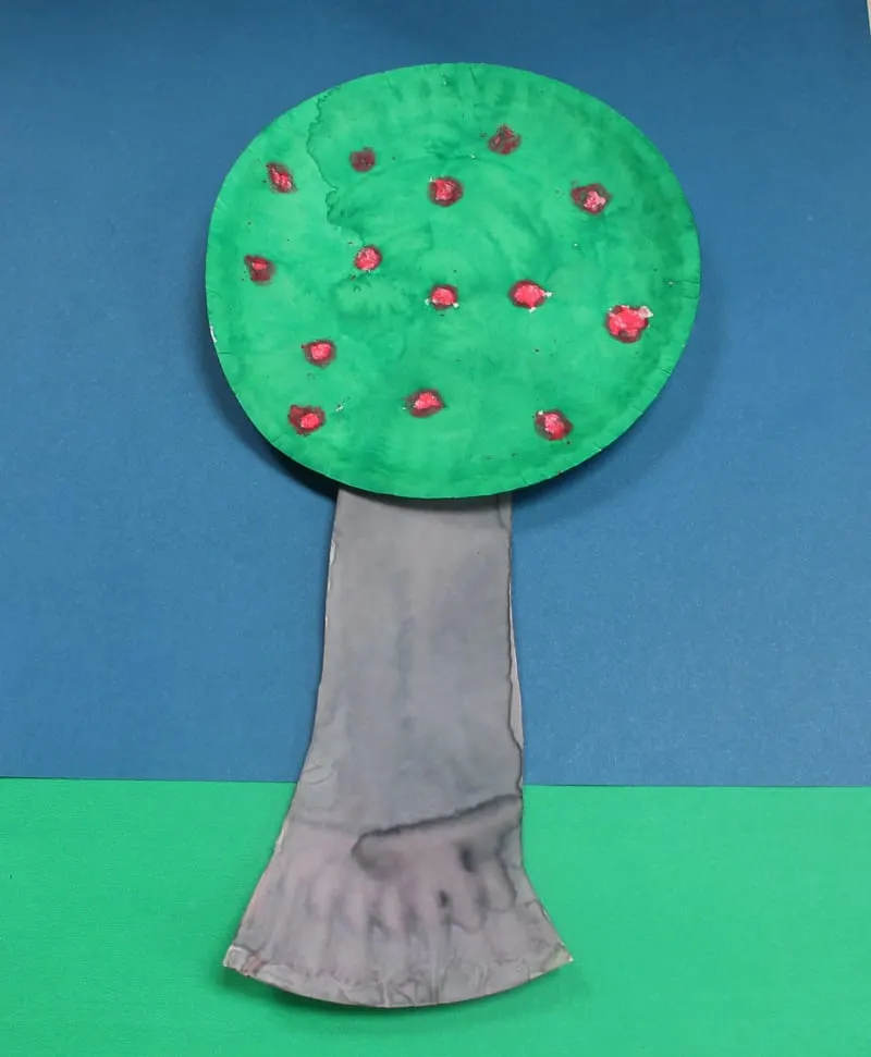 Using paper plates and watercolors turn them into an apple tree.