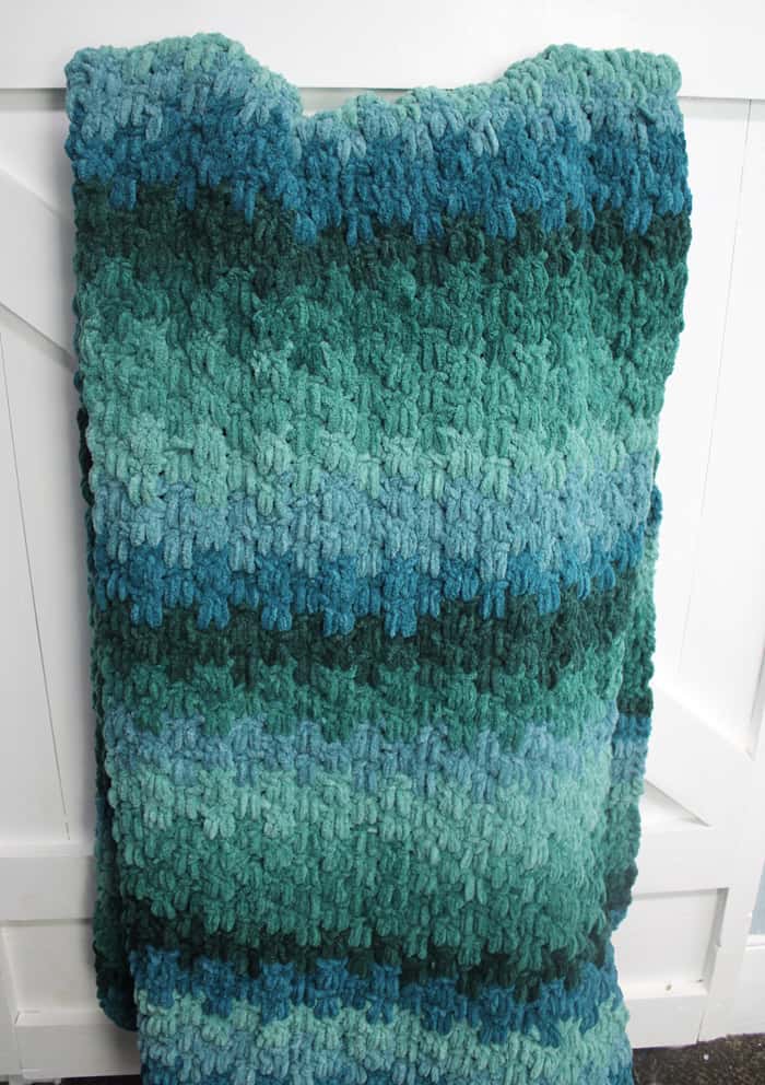 Make this chunky ombre throw blanket with this easy crochet pattern.