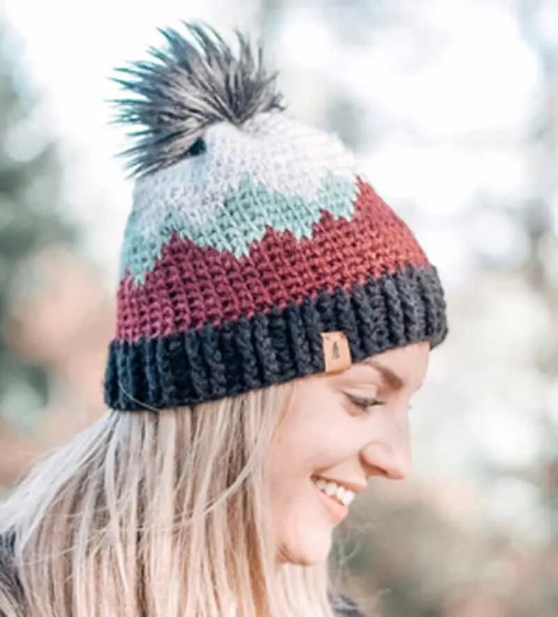 Make your own crocheted mountain winter hat.