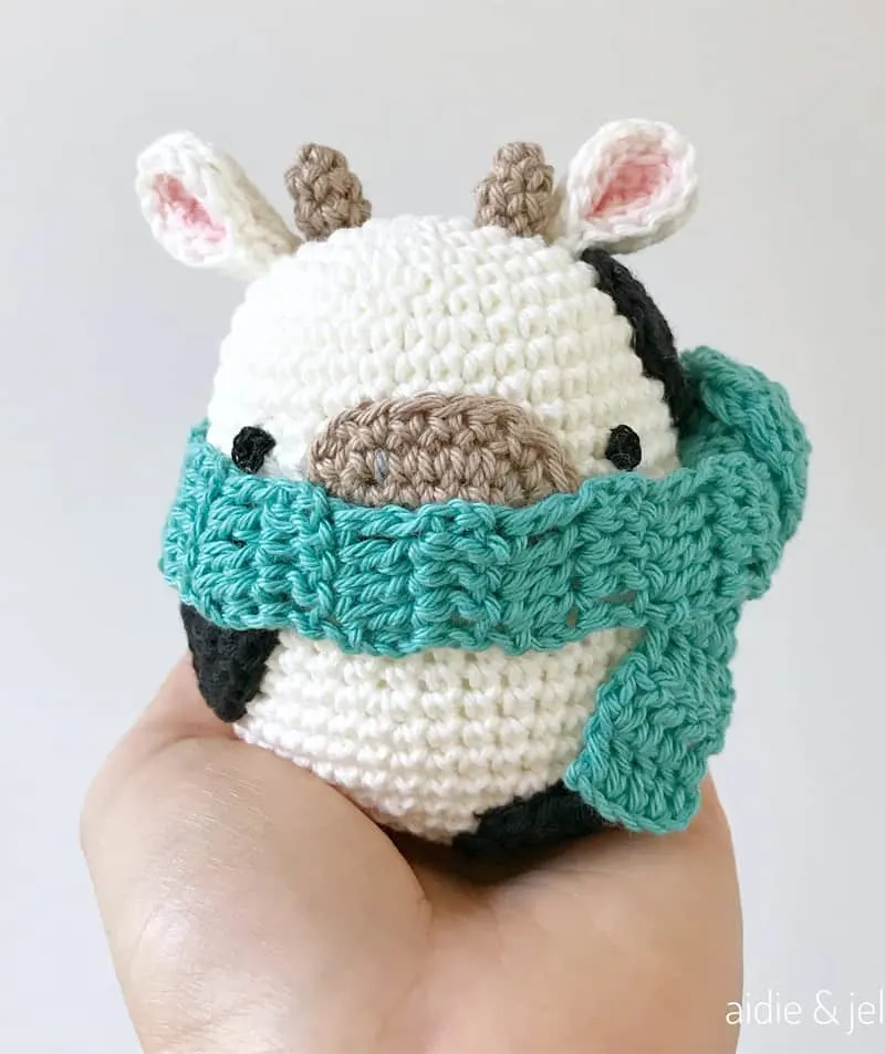 Make a cute egg shaped crochet cow pattern.