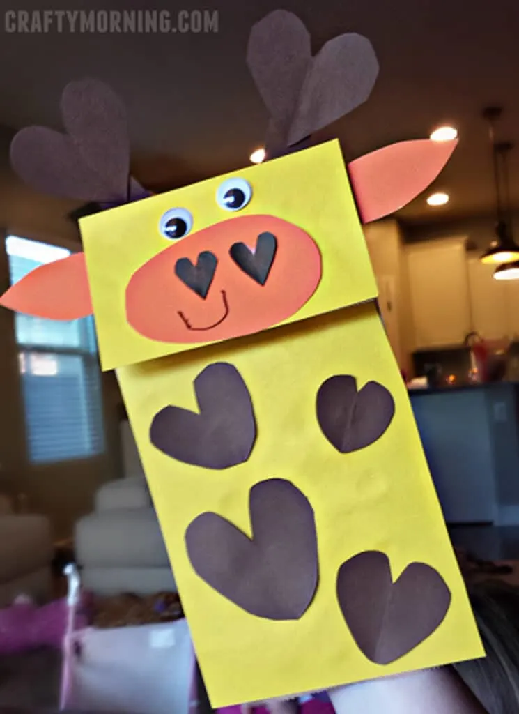 Make a fun giraffe puppet out of a paper bag with this easy preschool craft.
